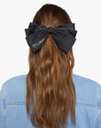 The Bow clipped onto model's hair