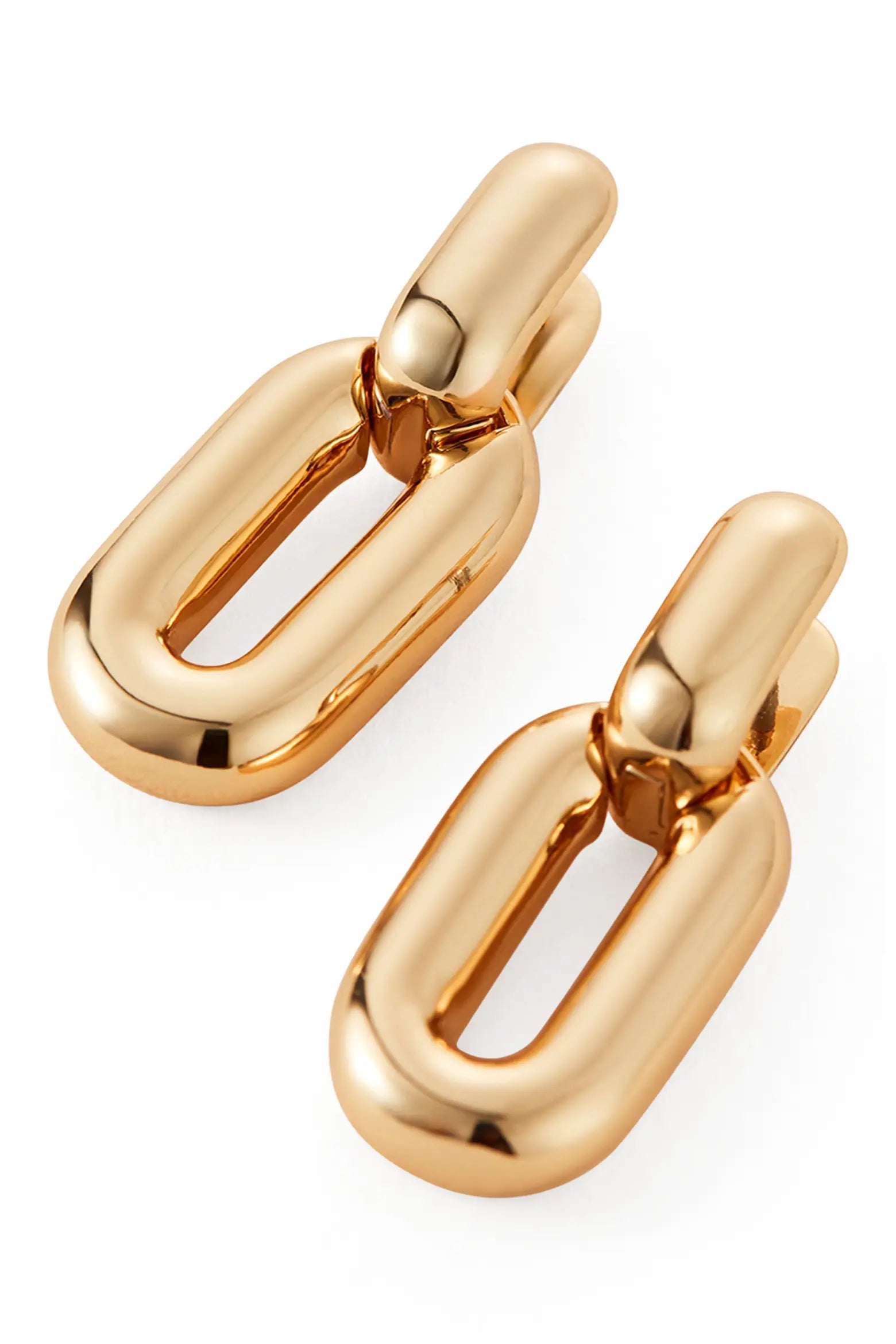 A pair of chunky, polished gold chain-link style earrings on a clean white background.