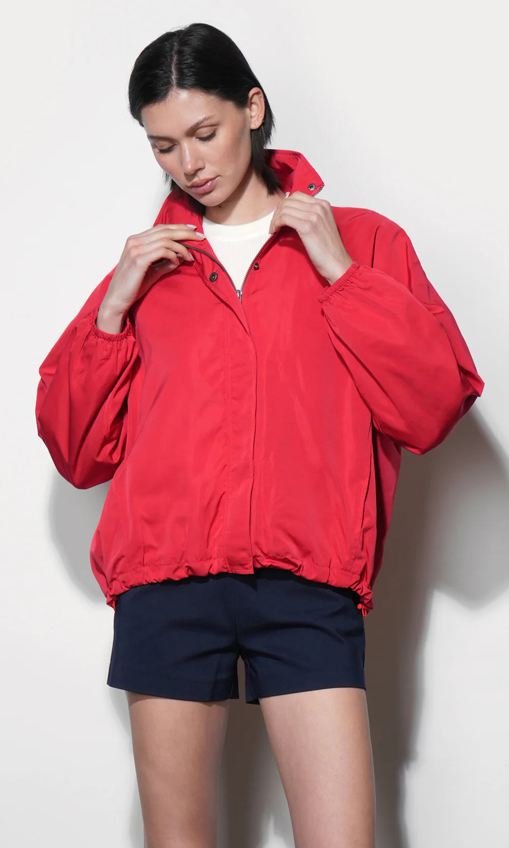 Gabrielle Lightweight Funnel Neck Jacket front, hands on collar