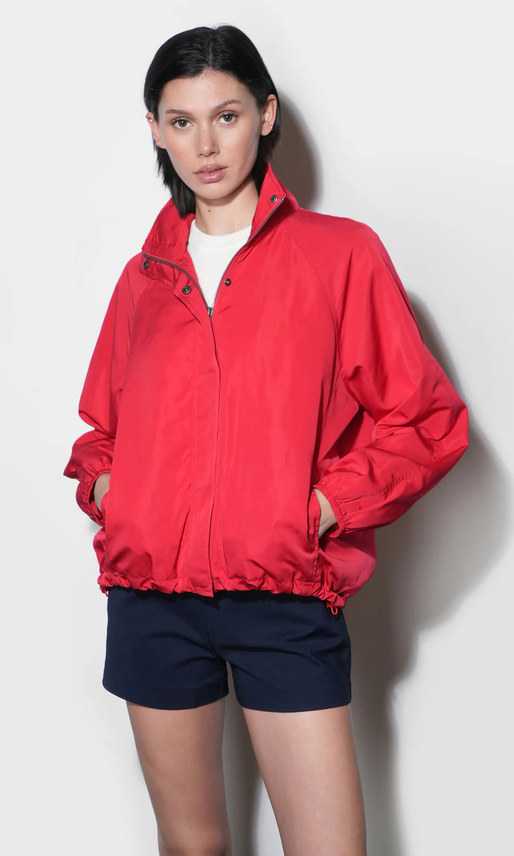 Gabrielle Lightweight Funnel Neck Jacket hands in pockets