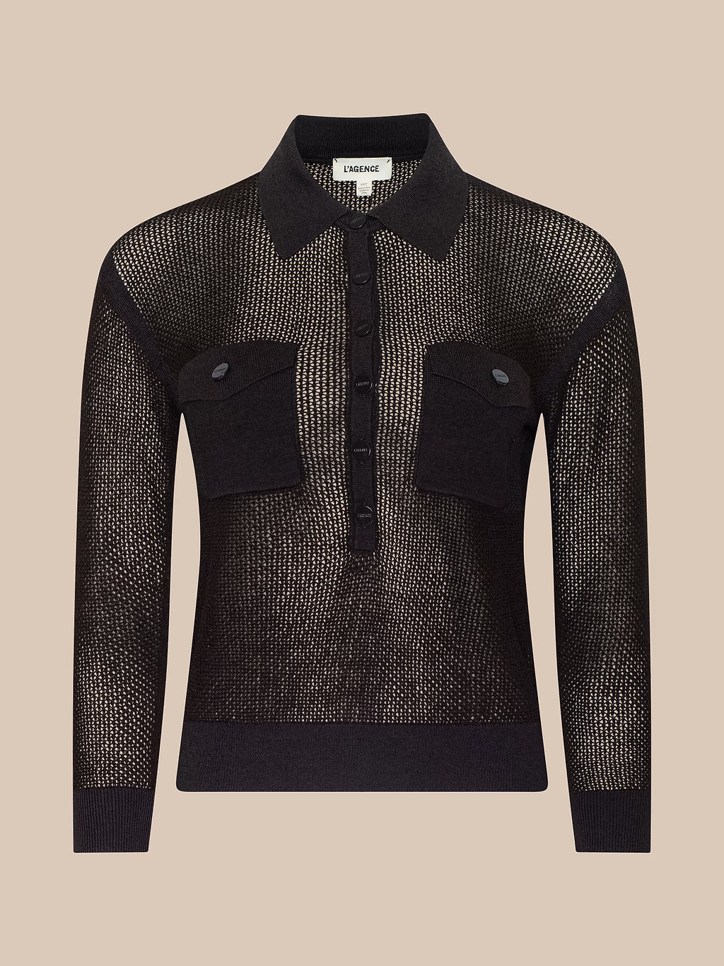 A black long-sleeve knit shirt-jacket with a sheer open-knit body, solid black collar, cuffs, and hem, and two buttoned chest flap pockets, shown on a beige background.