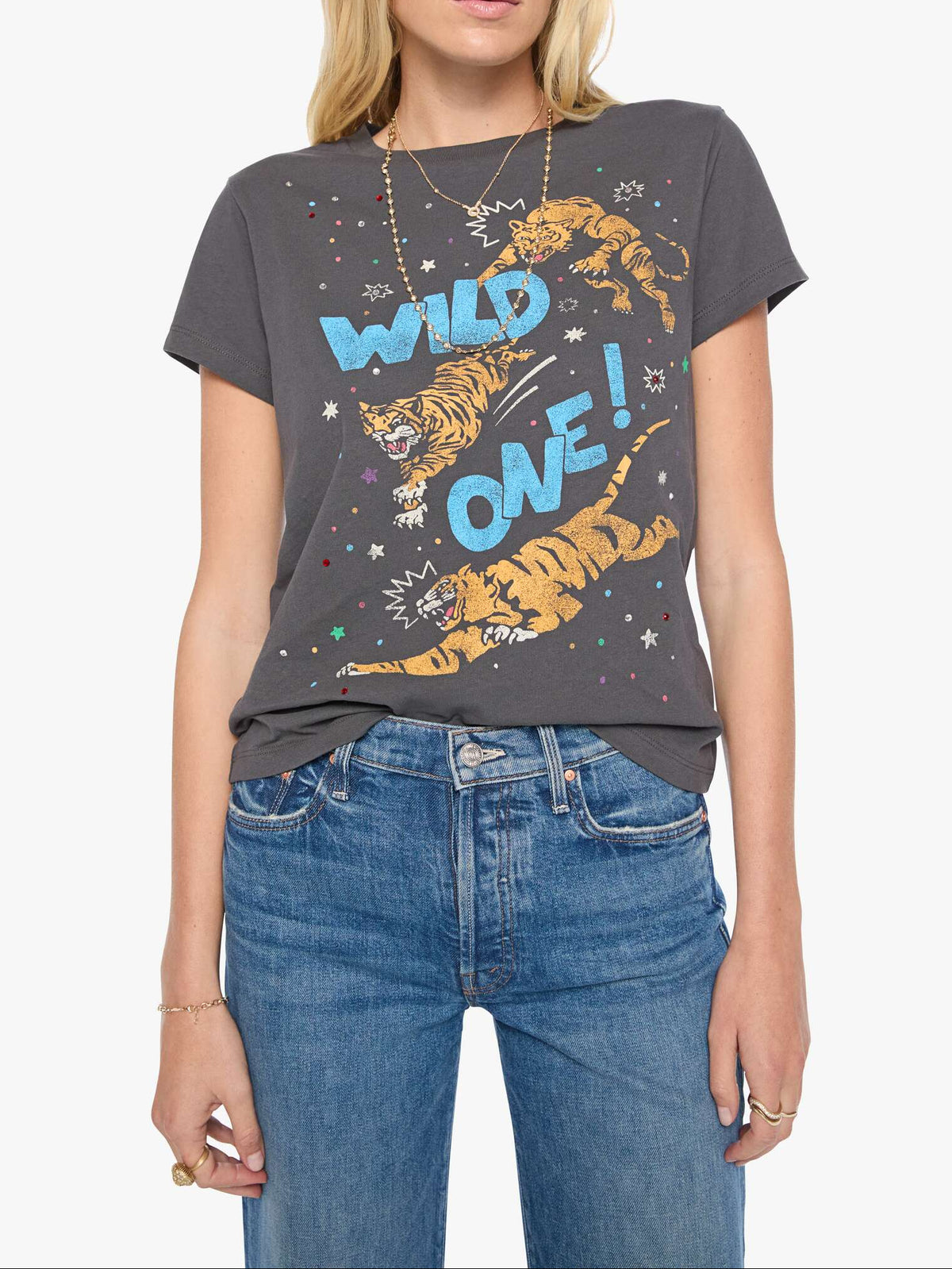 Woman wearing a dark gray t-shirt with tiger graphics and 'Wild One!' text on a white background