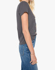 Woman wearing a gray t-shirt and blue jeans on a white background