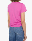 A person shown from the back wearing a bright pink short-sleeve crew-neck t-shirt and blue jeans, against a plain light gray background.