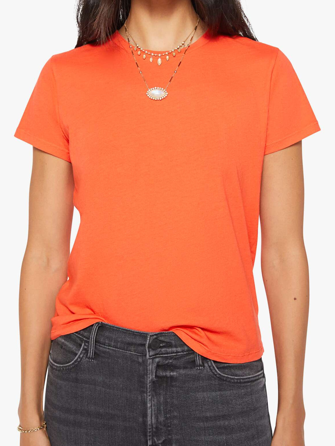 The Lil Goodie Goodie Tee in DRN close up front view on model