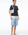 Tommy Beaded Bag Surf Babes full body view on shoulder