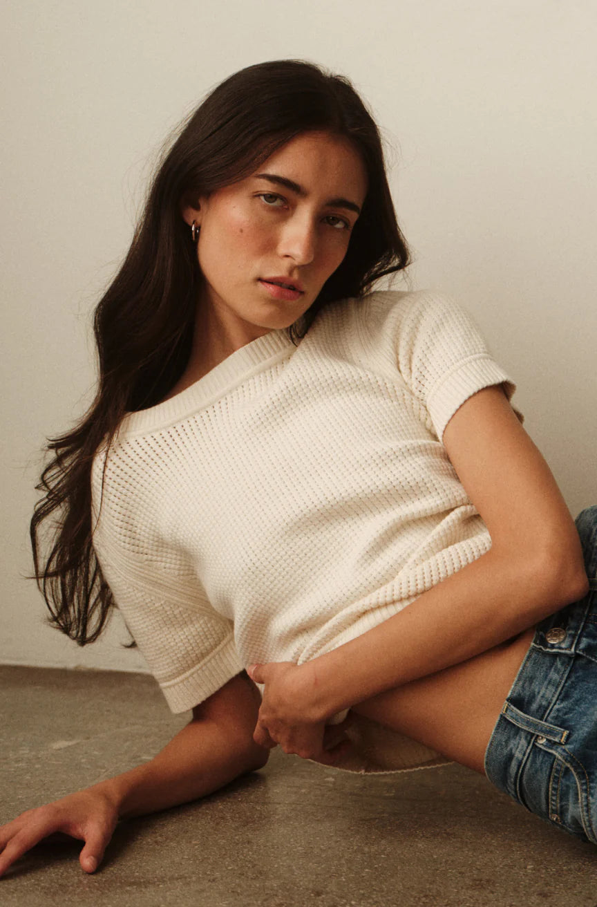  Noa Sweater model laying down