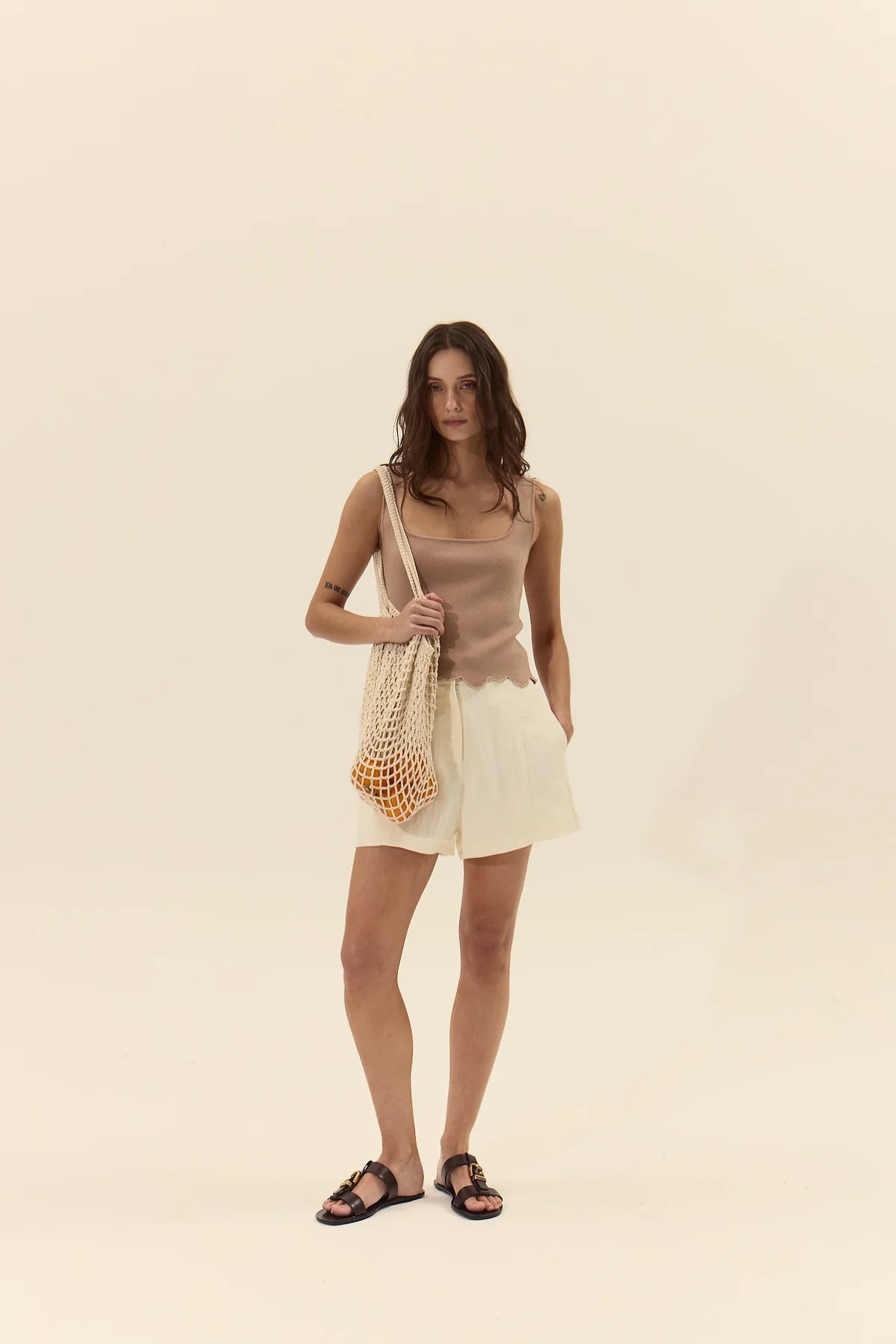 Ithaca Knit Top full body front with shopping bag
