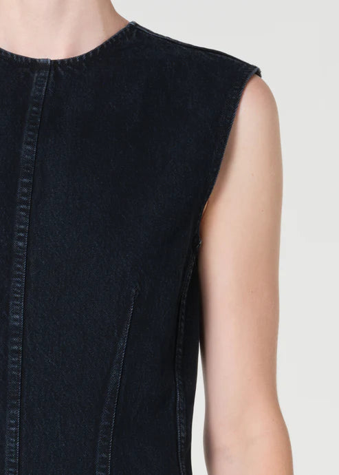 Black sleeveless dress on a plain background