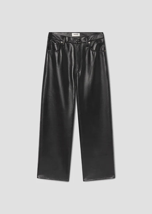 Black leather pants on a light gray background