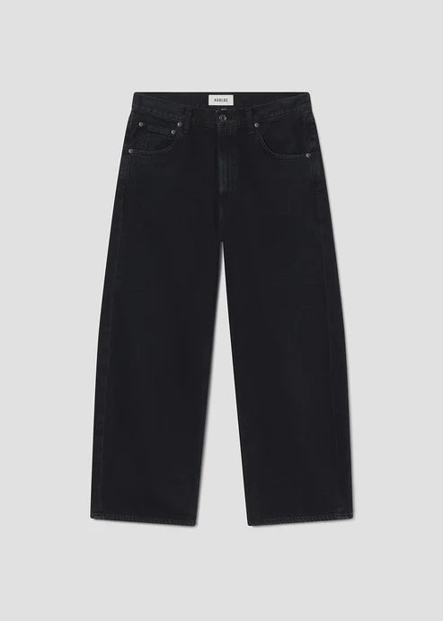 Black jeans on a light gray background