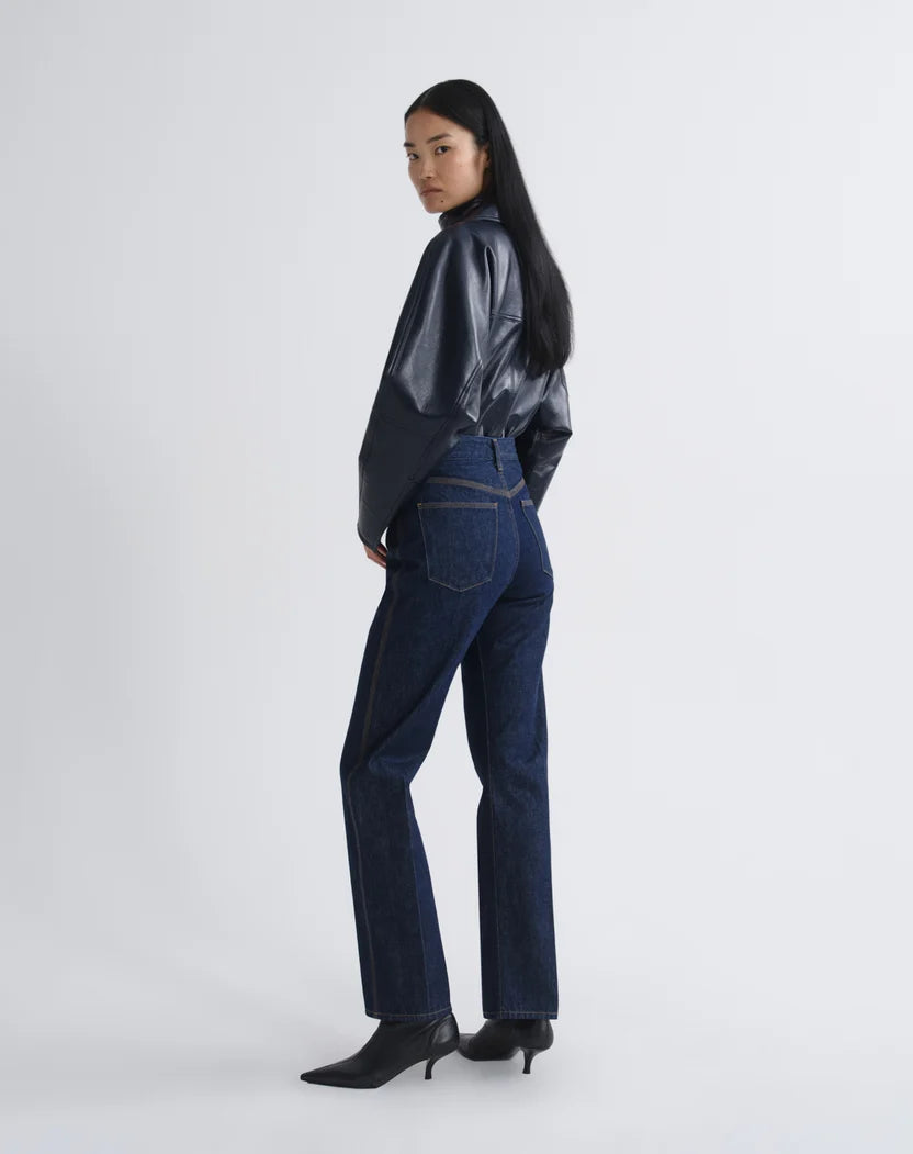 Morgan Jean in Rinse full body side and partial back view on model