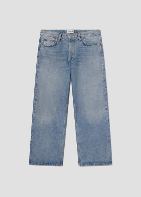 Blue jeans on a light gray background product view
