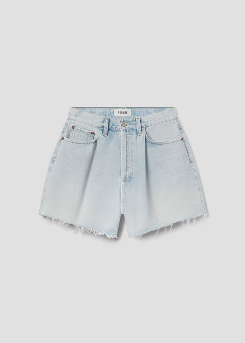 photo on light wash denim shorts on a white background