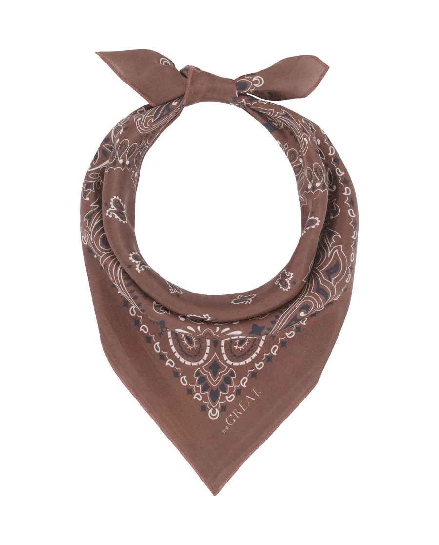 the silky bandana in chocolate tied to go around the neck on a white background 
