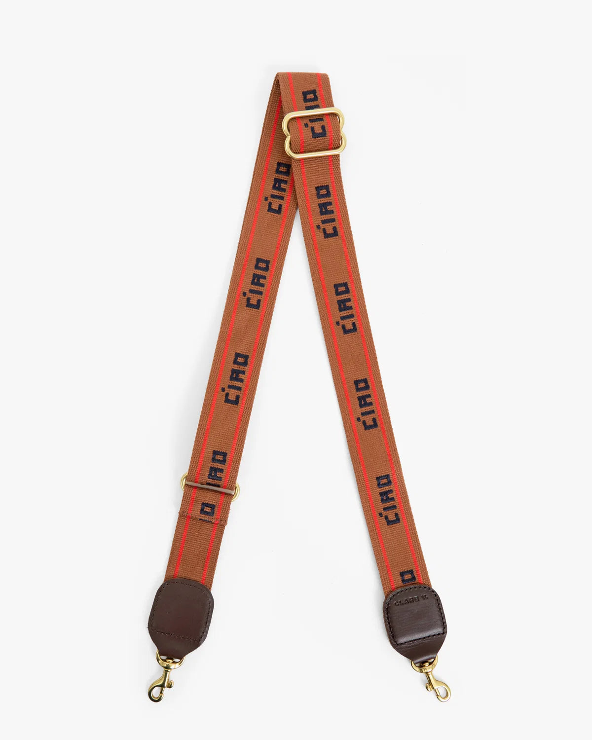 A wide orange-red fabric camera strap with a repeating black 'CIAO' logo print, featuring gold-tone metal hardware, a top adjustment buckle, and brown leather end caps with gold clasps, shown against a plain light gray background.
