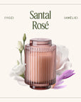 Santal Rosé candle with floral elements on a white background