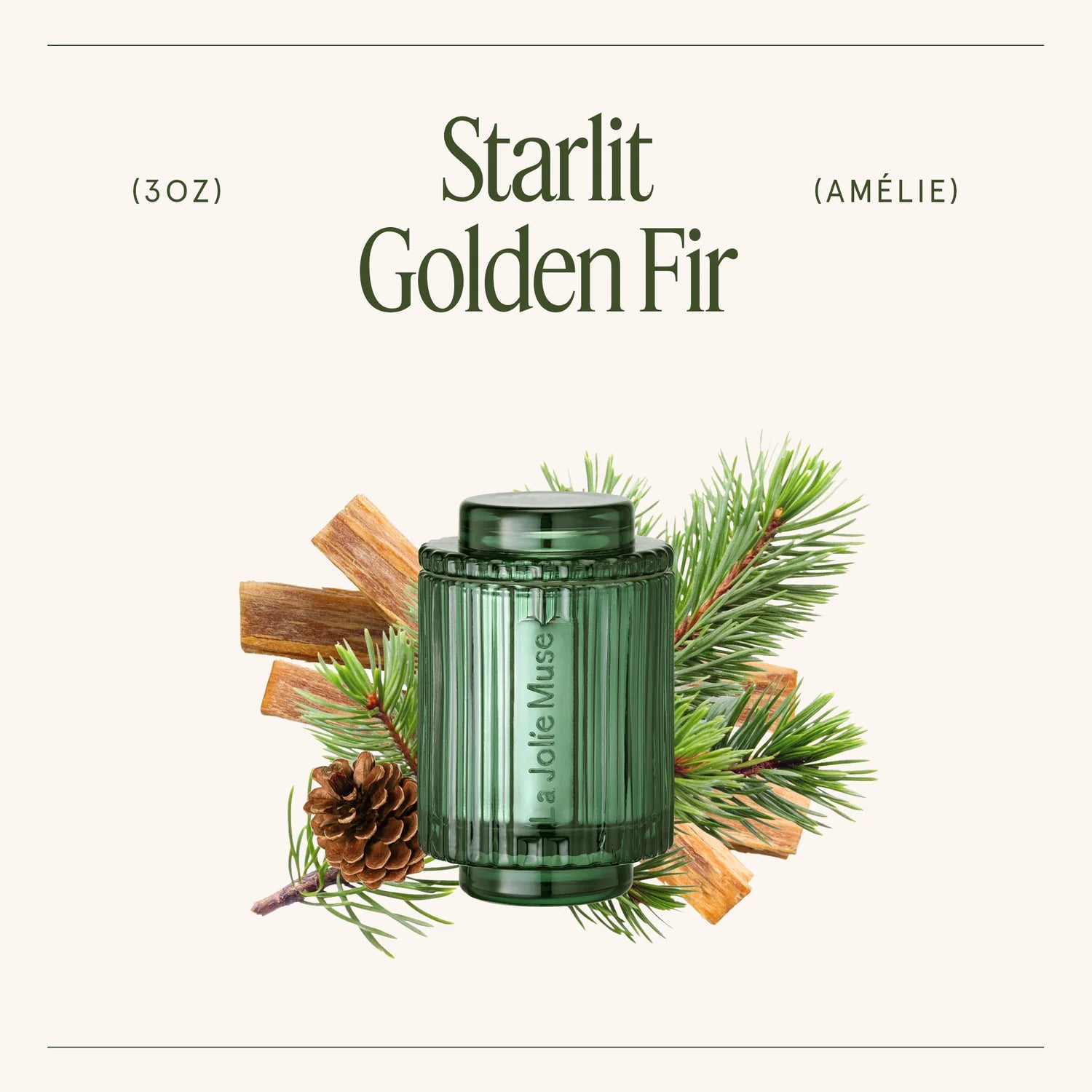 Green candle labeled 'Starlit Golden Fir' with decorative elements on a white background