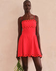 Andrea Dress model holding flowers