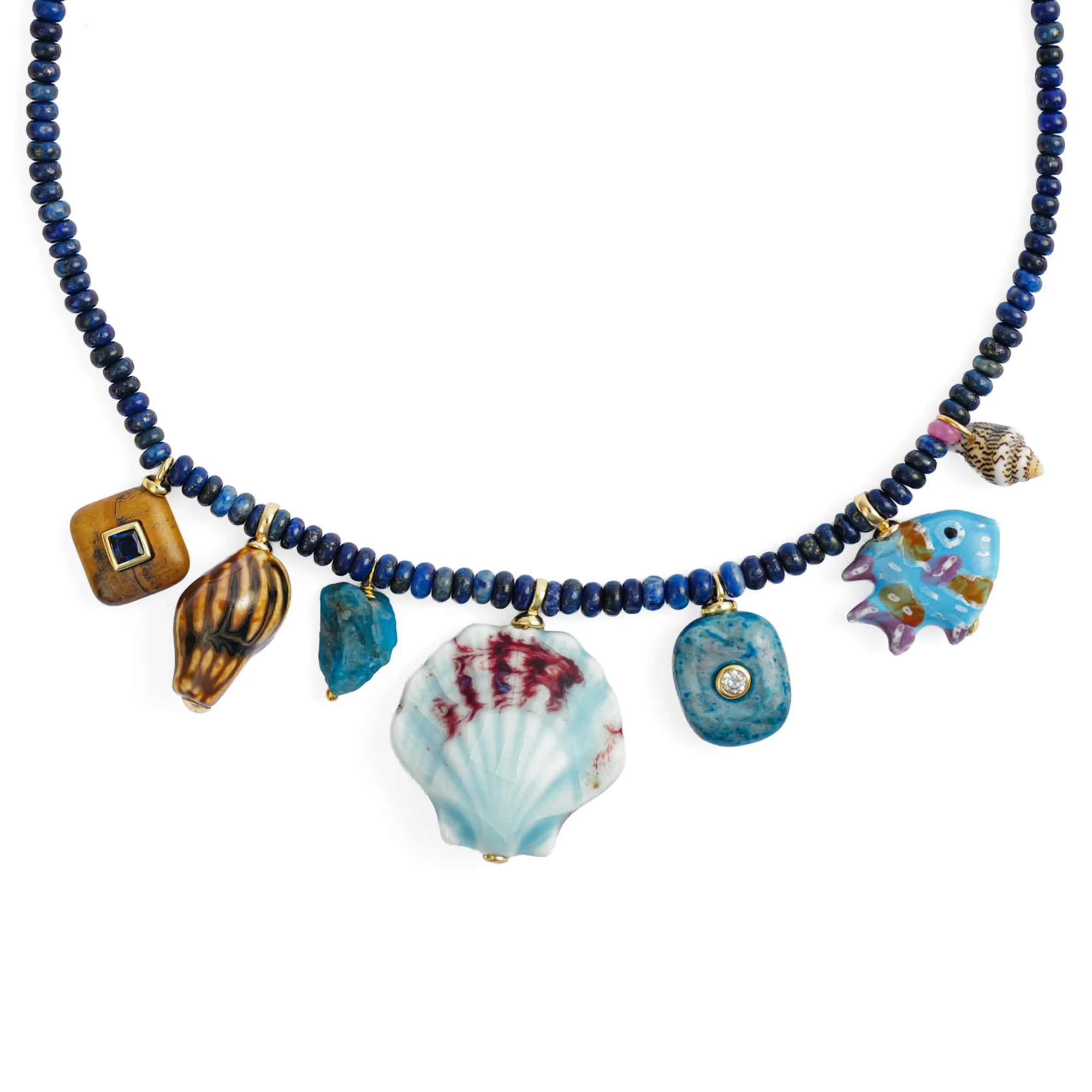 Necklace with blue beads and various charms on a white background