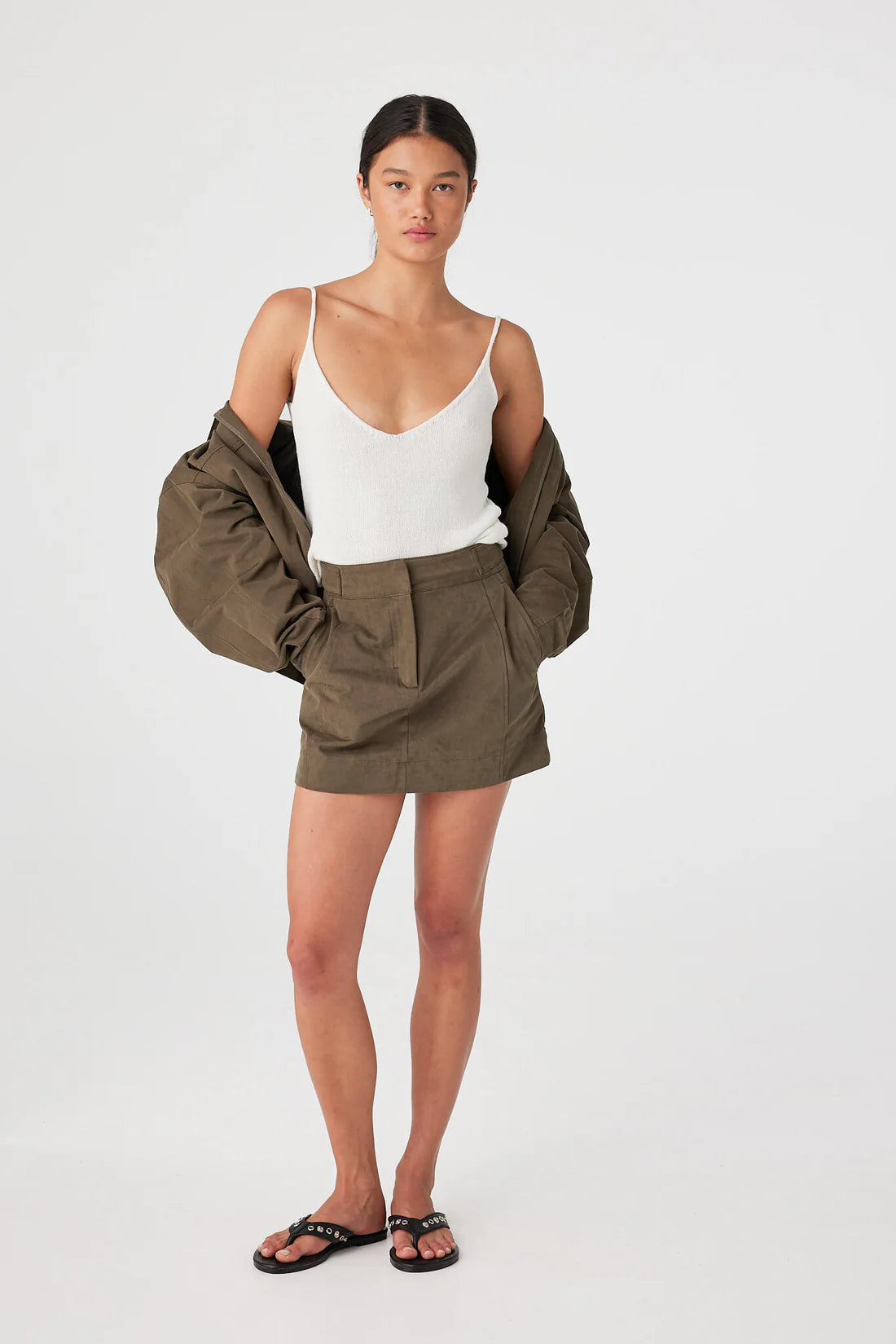 Eames Mini Skirt full body front, hands in pockets