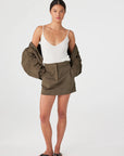 Eames Mini Skirt full body front, hands in pockets