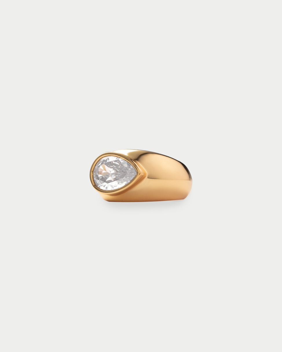 Gold hoop earrings with small diamonds on a white background