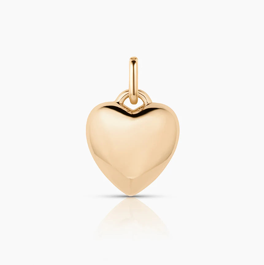 Gold heart-shaped pendant on a white background