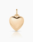 Gold heart-shaped pendant on a white background