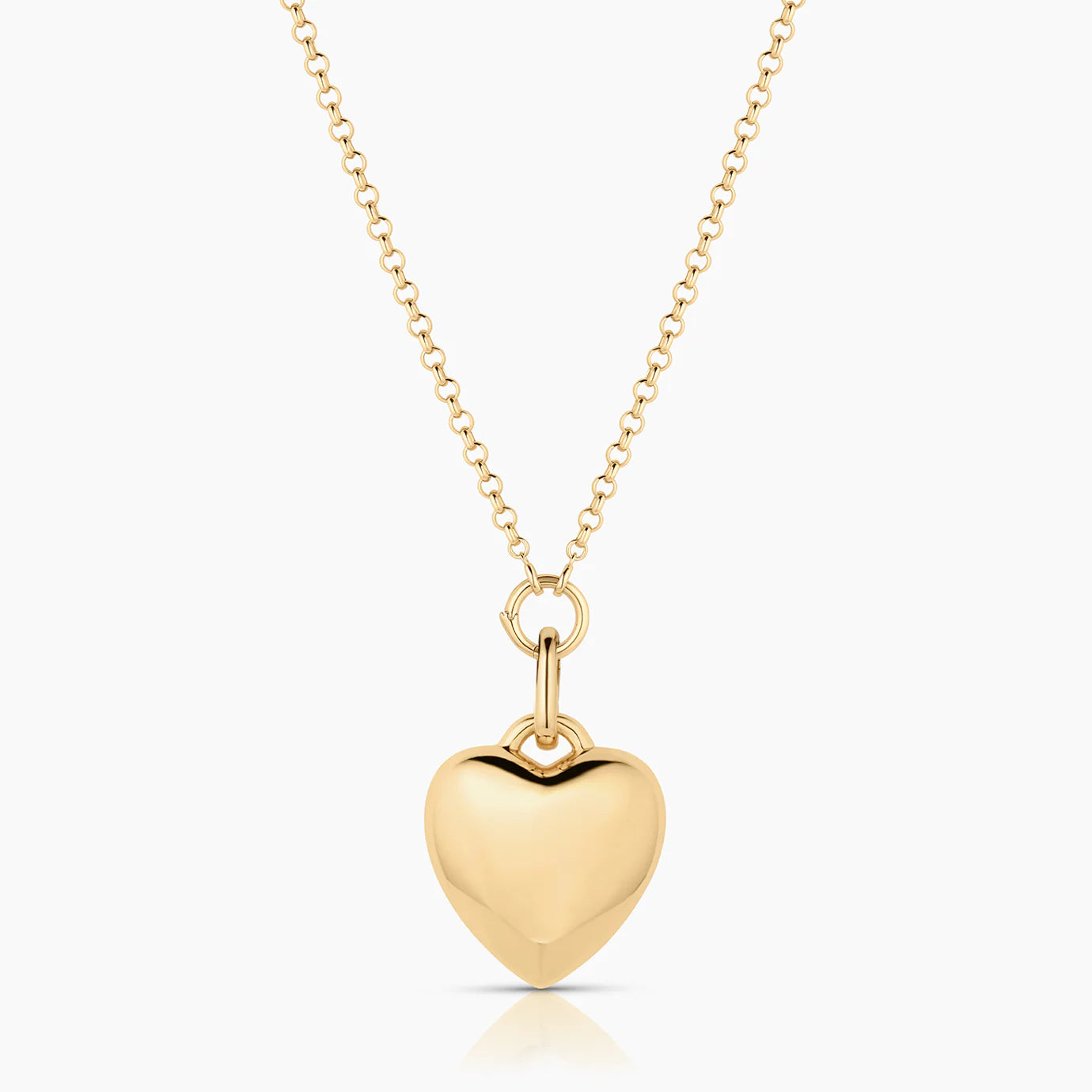 Gold heart-shaped pendant necklace on a white background