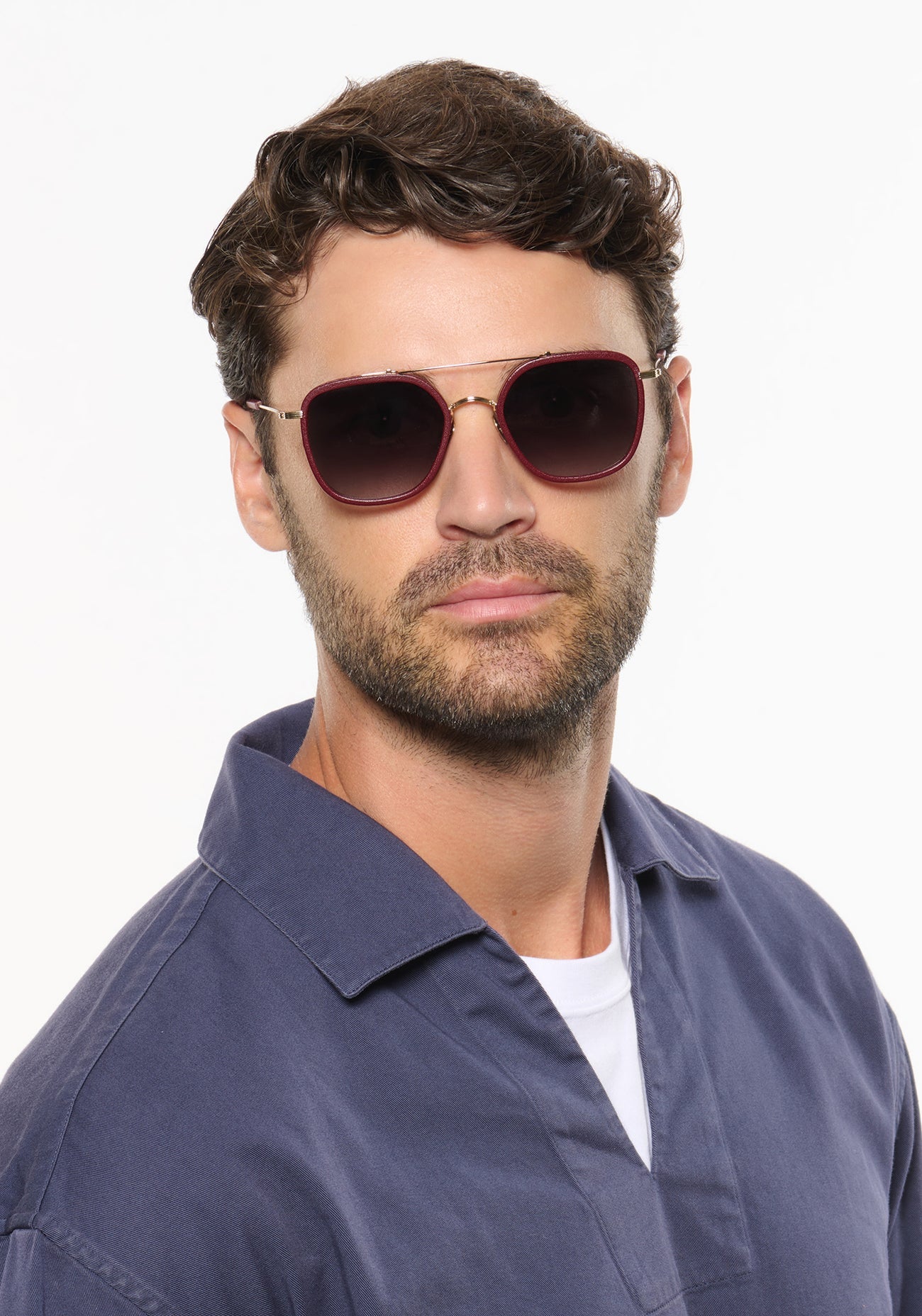 Austin 12K Titanium + Burgundy Leather Sunglasses on male model with average oval face shape
