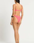 Model size XS wearing Gracie Balconette in Coral Pink, back