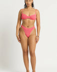 Model size M wearing Gracie Balconette in Coral Pink, front