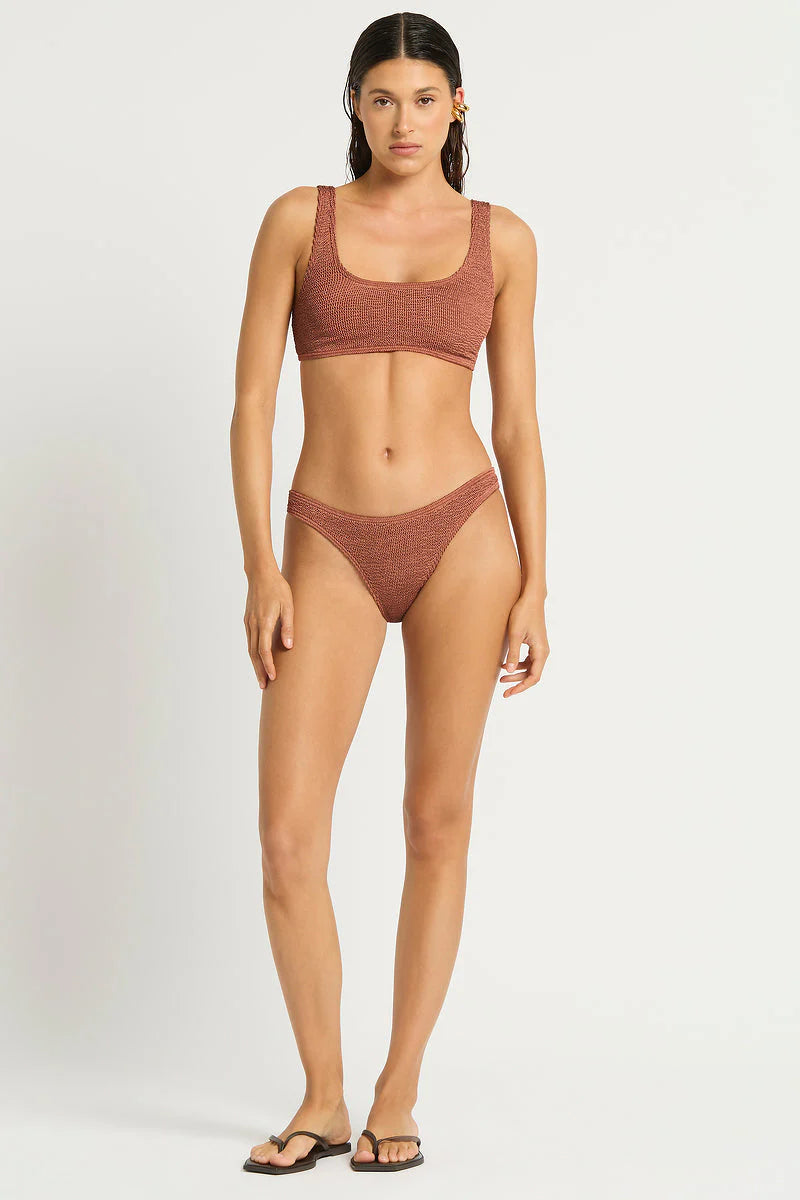 Model size XS wearing Malibu 2.0 Crop in Fawn Shimmer and Sign Brief in Fawn Shimmer, front