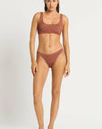 Model size XS wearing Malibu 2.0 Crop in Fawn Shimmer and Sign Brief in Fawn Shimmer, front