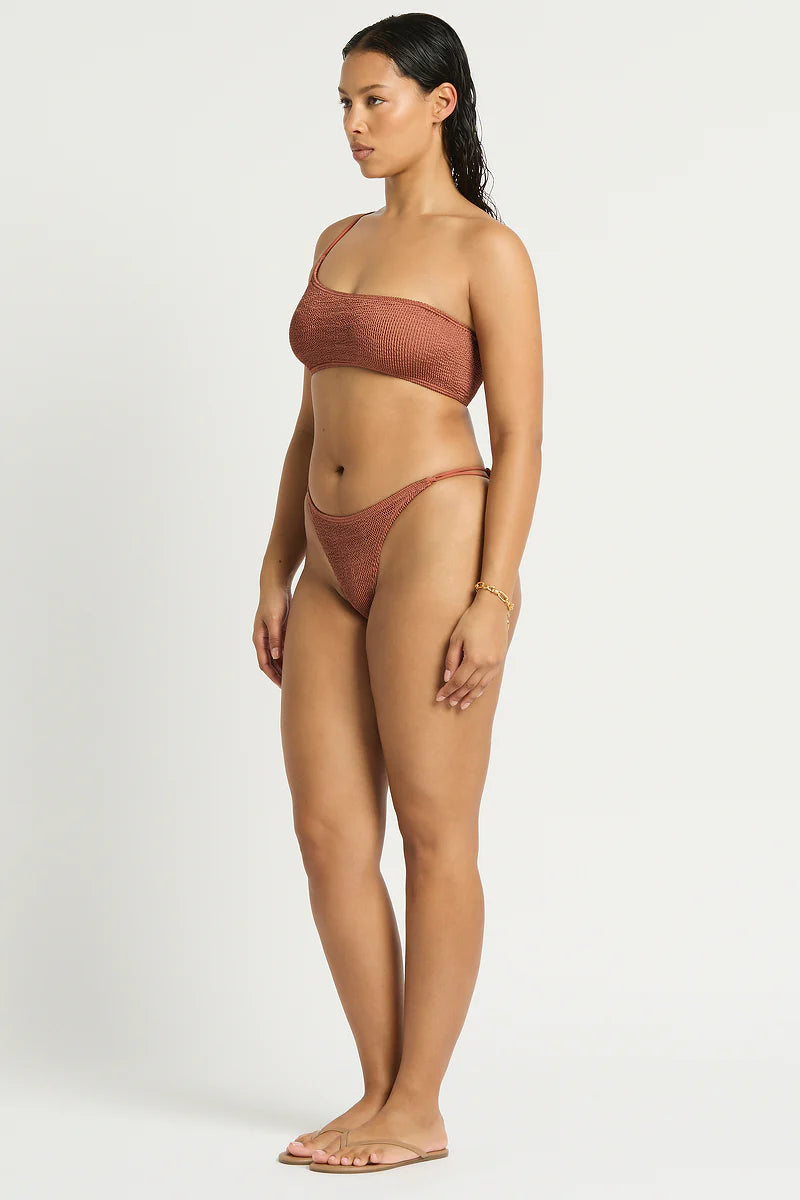 Model size M wearing Lotus Crop in Fawn Shimmer, side