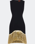 A sleeveless black knit dress with a metallic gold fringe hem, shown against a light gray background.