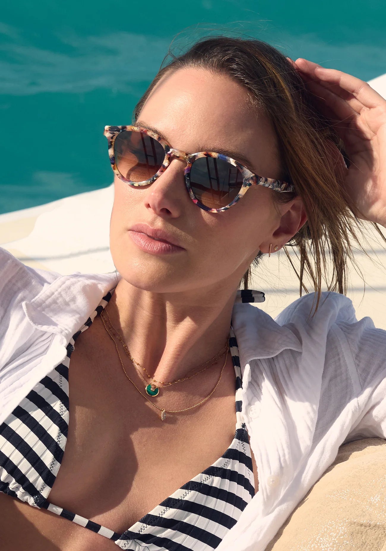 Barrett Amalfi Sunglasses on model in a pool with average square face shape
