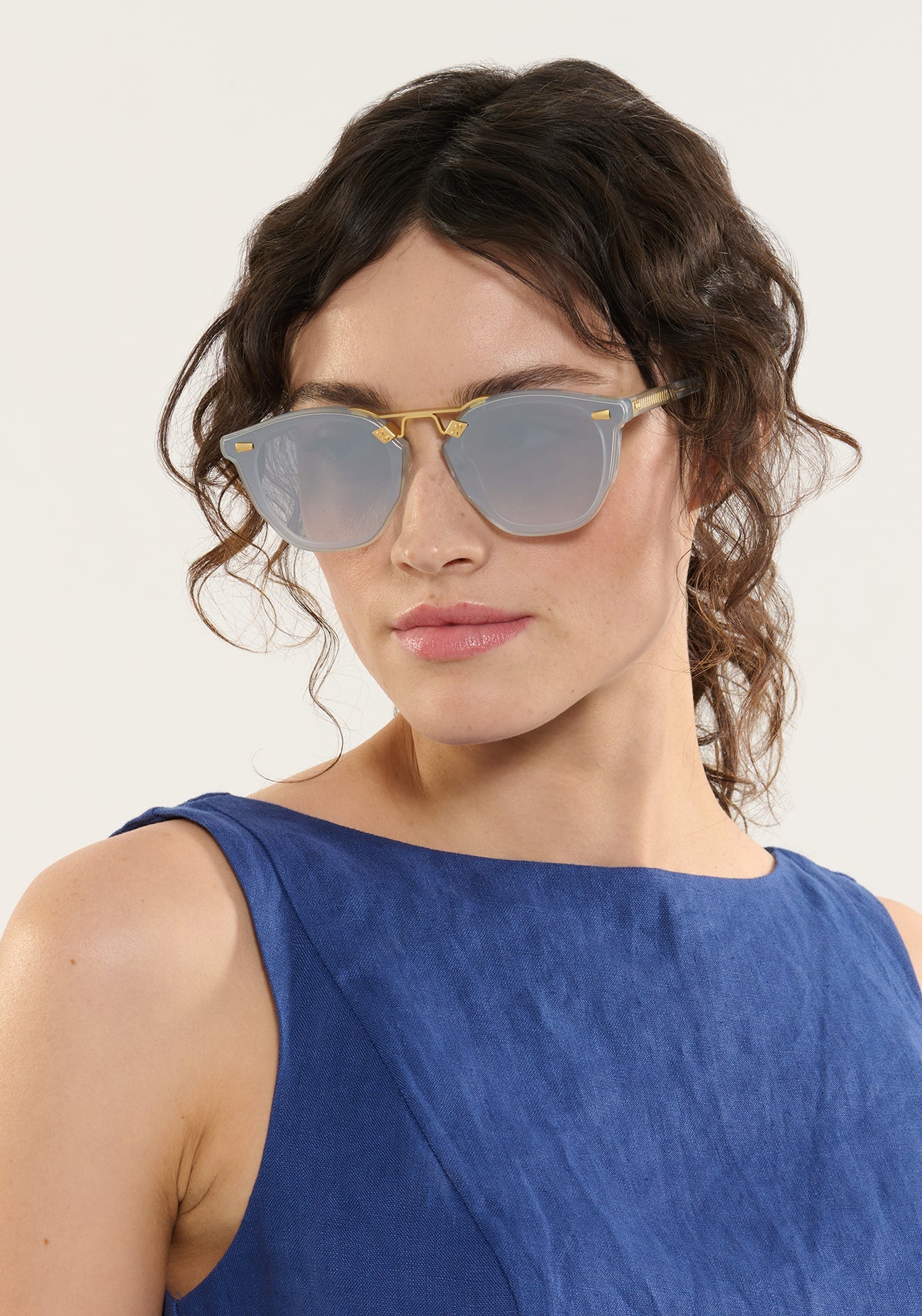Beau Nylon Sunglasses Powder Blue 18K Mirrored on model with average, heart face shape