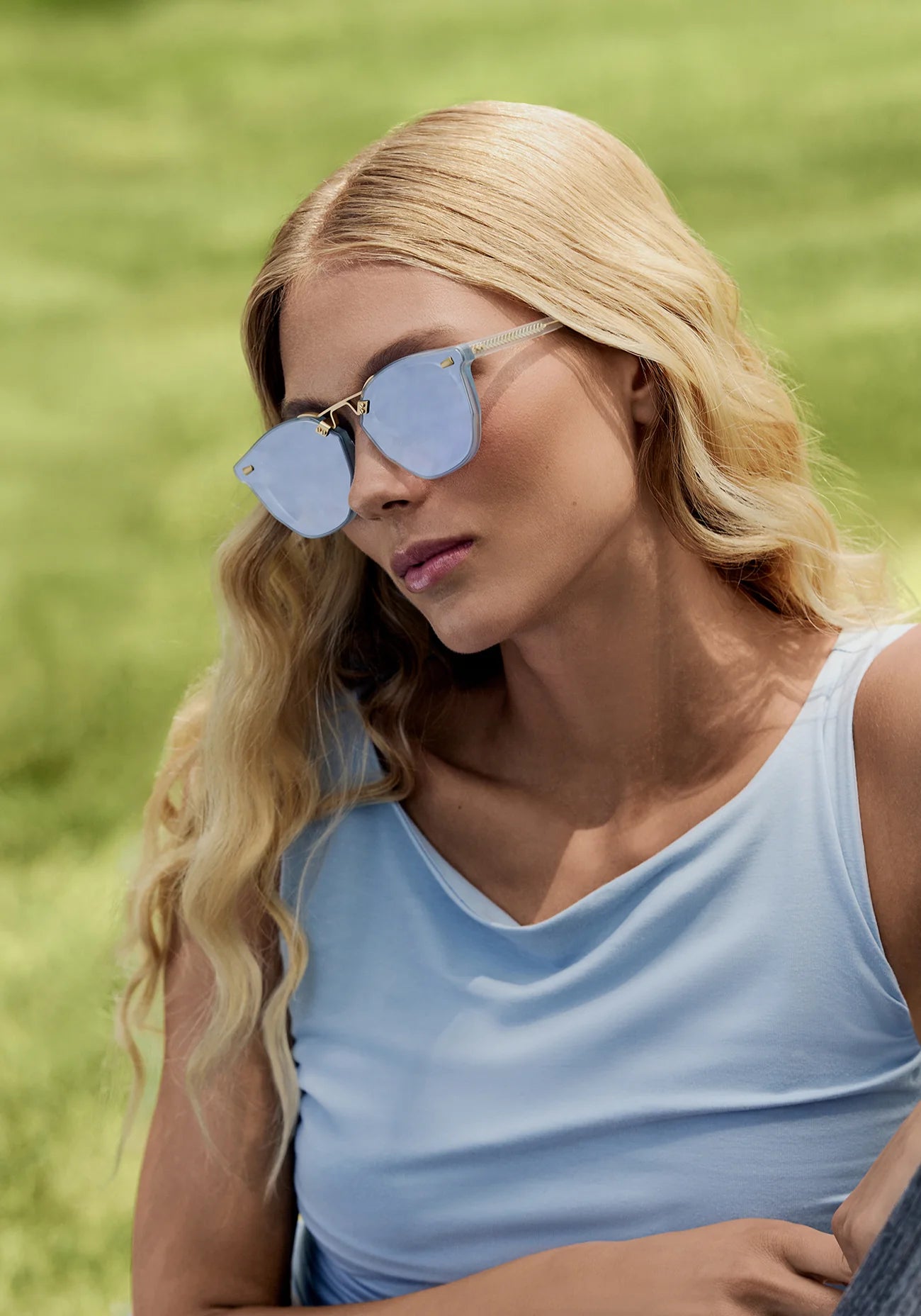 Beau Nylon Sunglasses Powder Blue 18K Mirrored on model with average, heart face shape