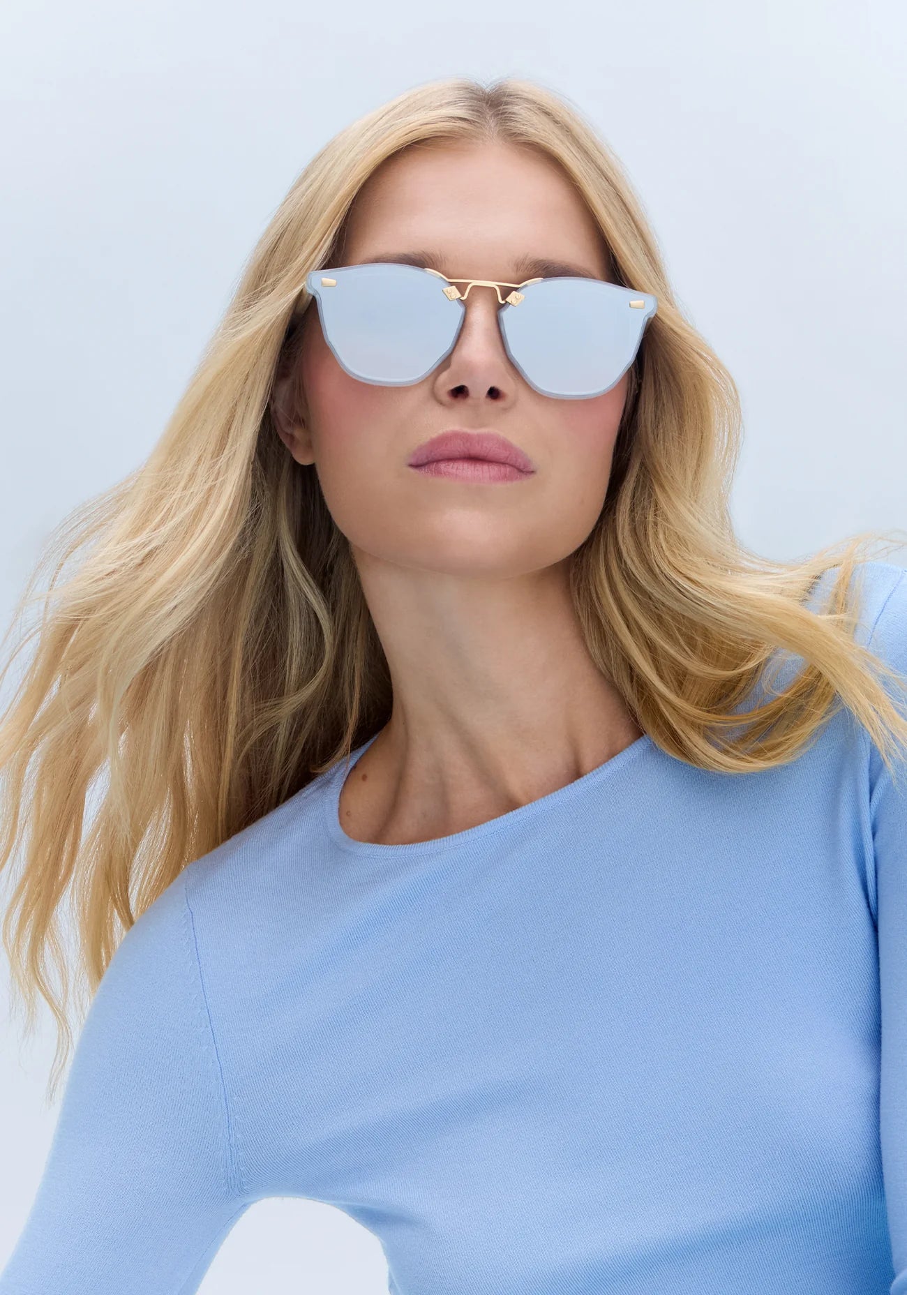 Beau Nylon Sunglasses Powder Blue 18K Mirrored on model with average, oval face shape