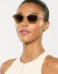 Bella Silver + Chartreuse Sunglasses on model with average oval face shape