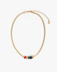 Gold necklace with colorful beads on a white background