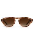 Oversized round sunglasses with a translucent brown acetate frame and matching brown gradient lenses, shown against a plain white background.