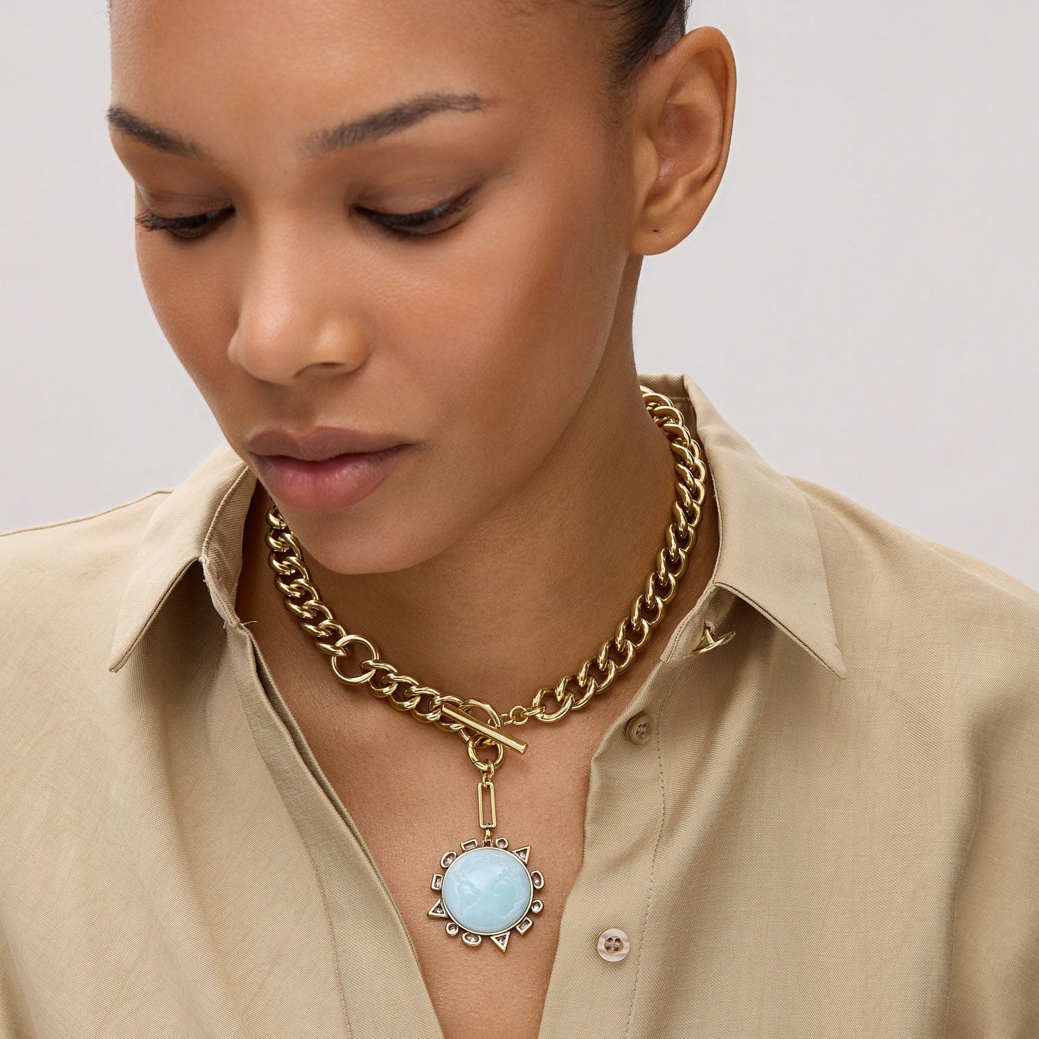 Odyssey Necklace in Baby Blue front view on model showing blue side