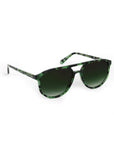 Sunglasses with tortoiseshell frame and green lenses on a white background