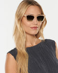 Brigette Blonde Sunglasses on model with average oval face shape