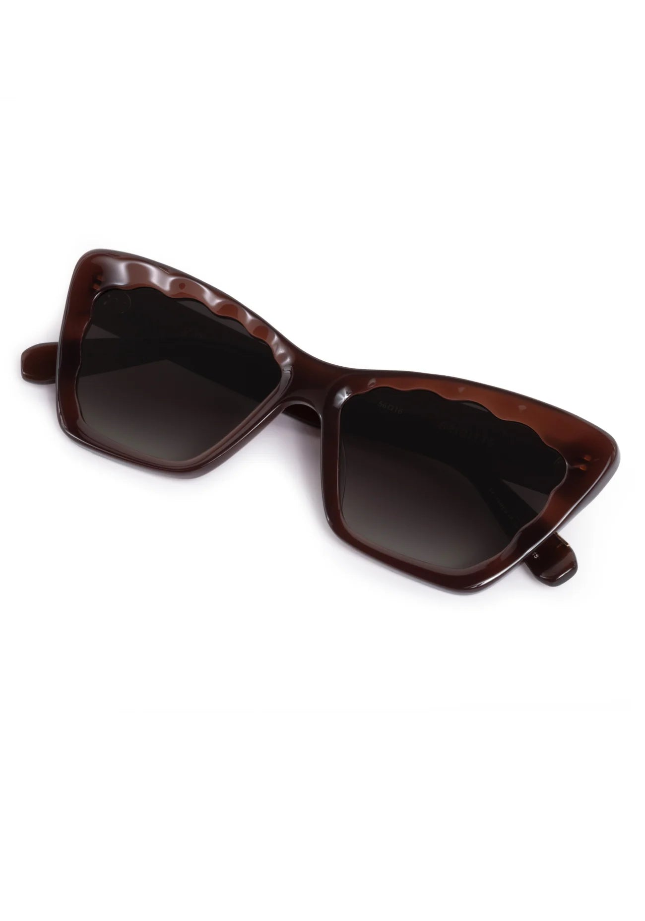 Brown sunglasses with dark lenses on a white background