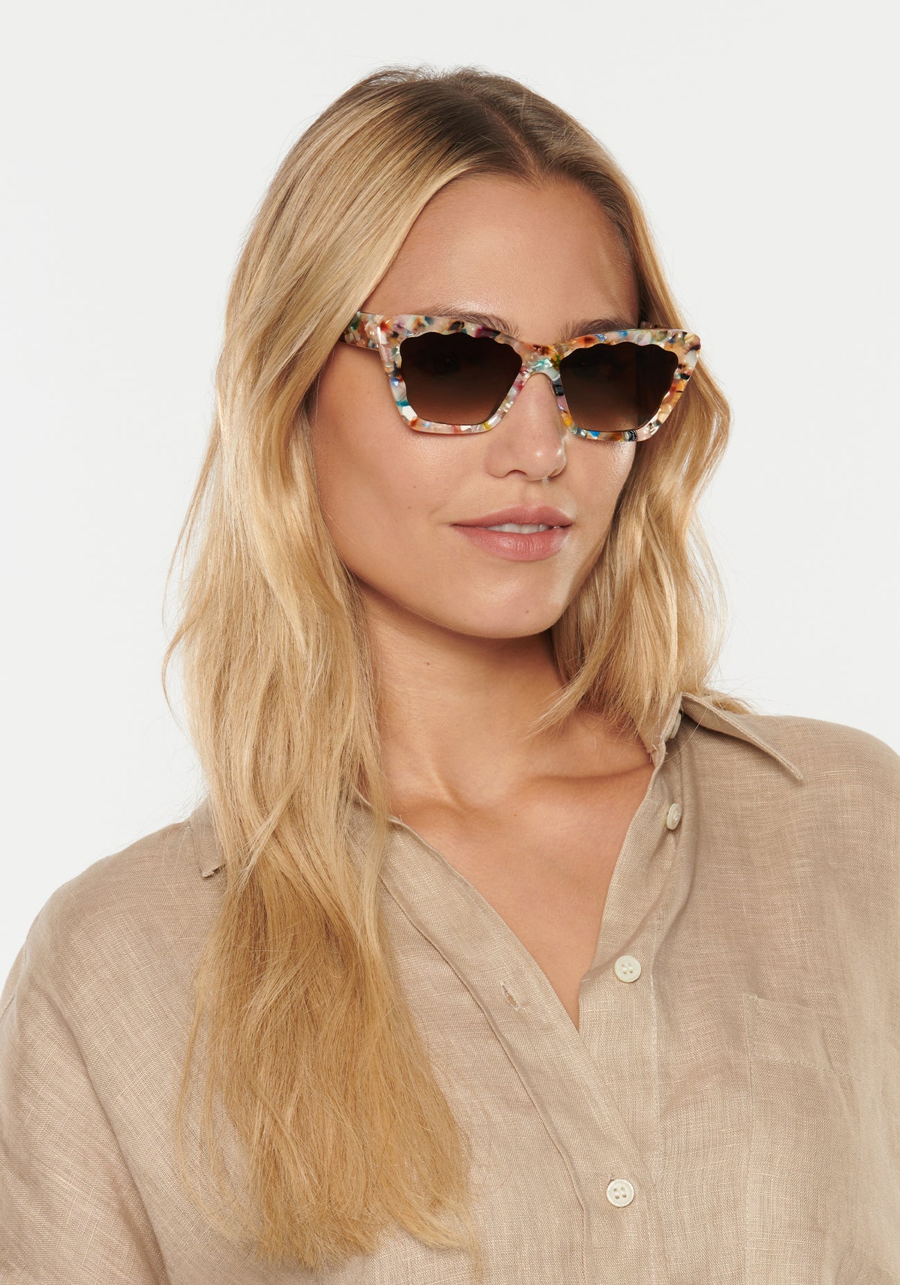 Brigette Gelato Sunglasses on model with average oval face shape, wearing tan top
