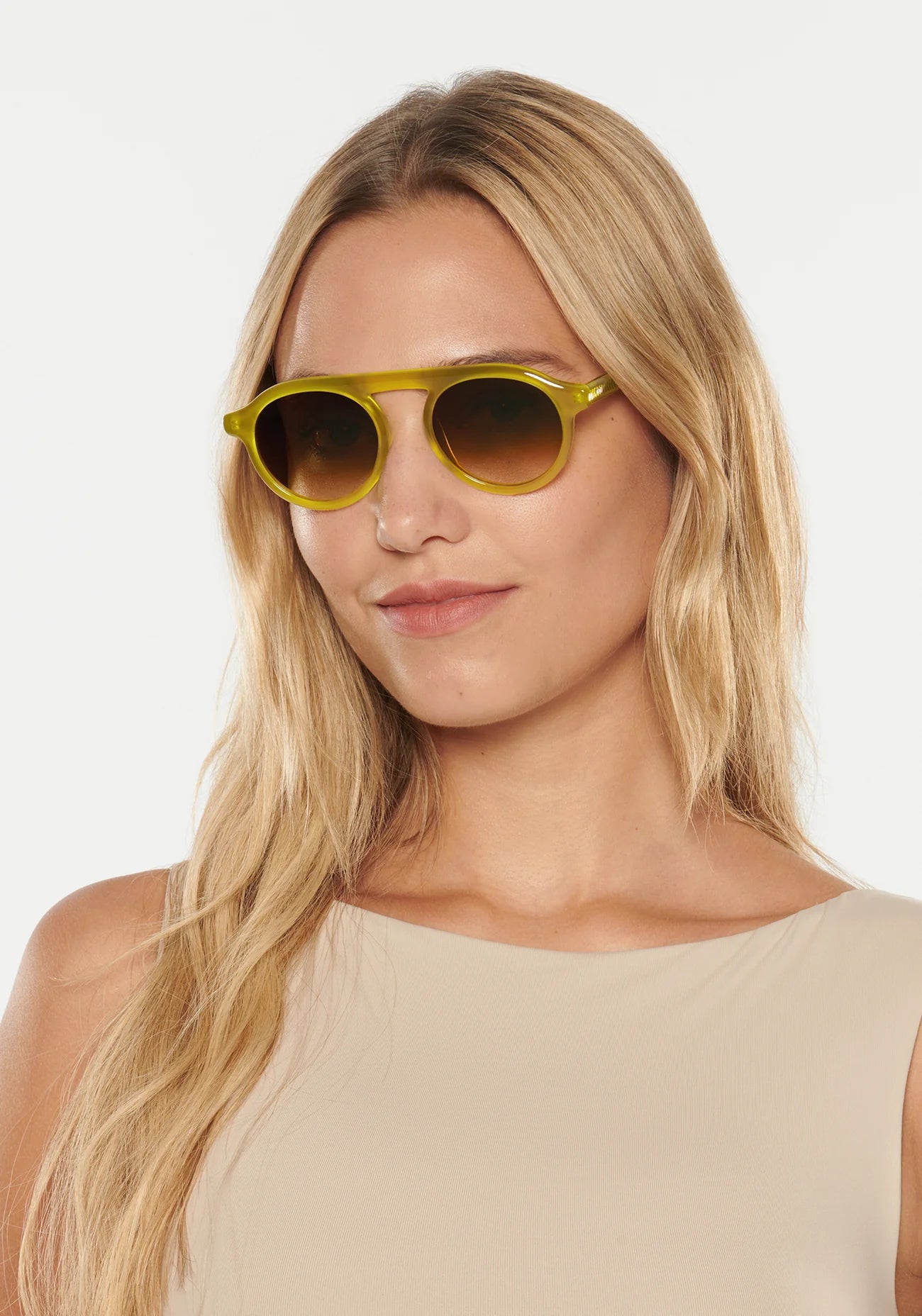 Cameron Chartreuse Sunglasses on model with average oval face shape